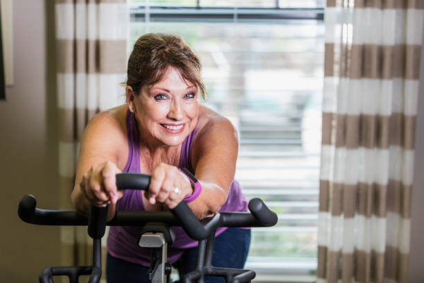 istock Senior woman exercising in a gym 1094634002