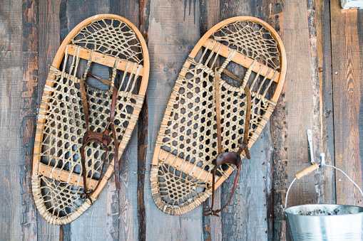 Traditional snowshoes hanging on wooden wall,Kirkenes, Finnmark, Norway