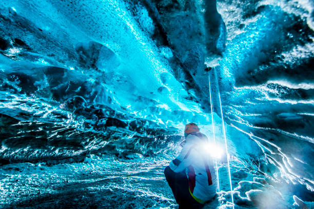 istock Woman inside of ice cave,Iceland 1094639740