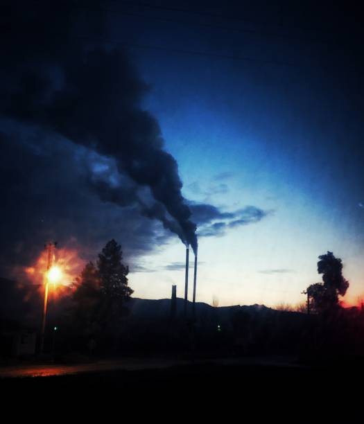 istock Smoke out a factory chimney 1094639788
