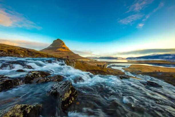 Photo of Kirkjufell mountain and Kirkjufellsfoss, Sneafellsness,Iceland