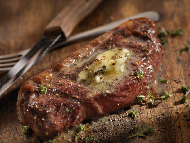 istock Medium Rare Top Sirloin Steak with Herb Garlic Butter 1094641618