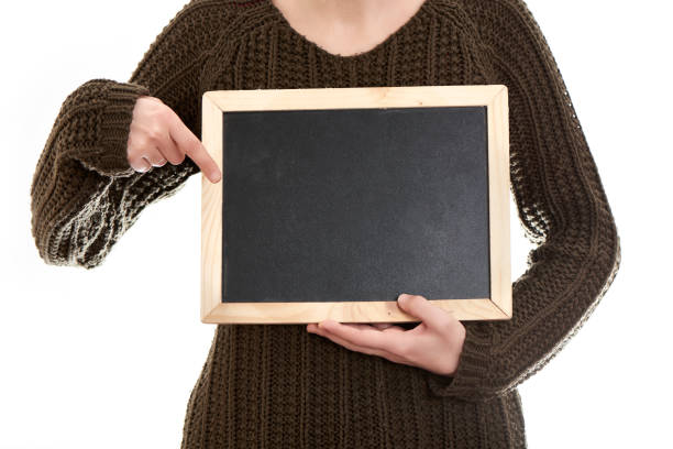 istock Woman Holding Blank Blackboard 1094648630