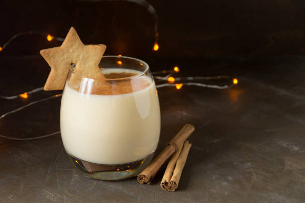 istock Cocktail eggnog on a background of bokeh lights. 1094649572