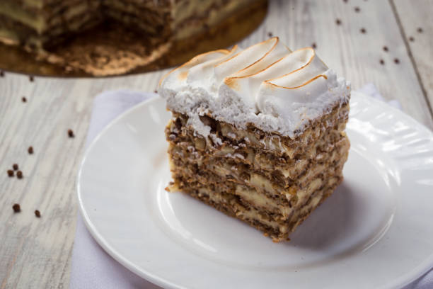 istock shortbread cake with cream with condensed milk, chocolate and nuts 1094650994