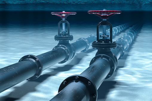Pipeline lying on ocean bottom underwater. 3D rendering