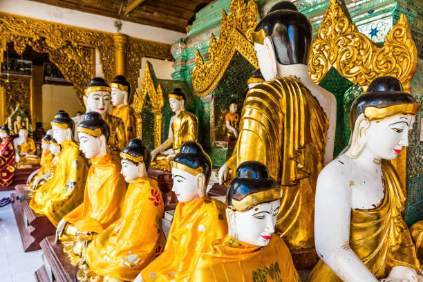 Buddha statues of the Shwedagon Pagoda at Yangon (Rangoon) in Myanmar (Burma)