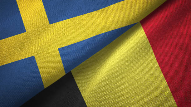 istock Belgium and Sweden two flags together textile cloth fabric texture 1094667984