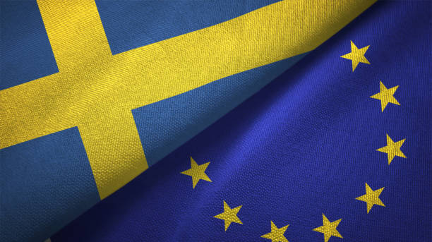 European Union and Sweden two flags together textile cloth fabric texture European Union and Sweden flag together realtions textile cloth fabric texture government large currency finance stock pictures, royalty-free photos & images