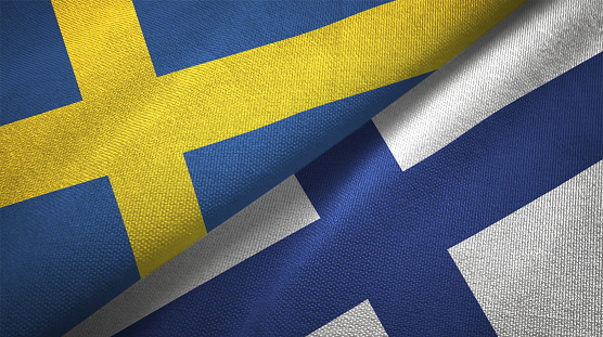 Finlandia y Suecia dos banderas juntas textil tela textura de la tela photo