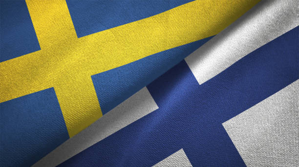 finland and sweden two flags together textile cloth fabric texture - suécia imagens e fotografias de stock