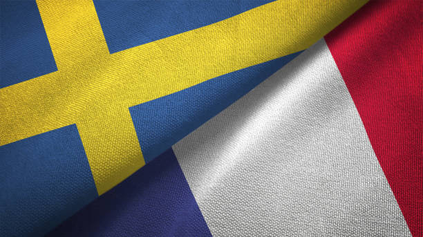 istock France and Sweden two flags together textile cloth fabric texture 1094668350
