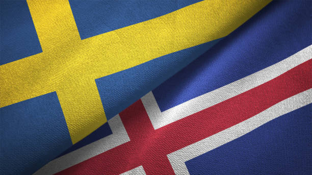 istock Iceland and Sweden two flags together textile cloth fabric texture 1094668376