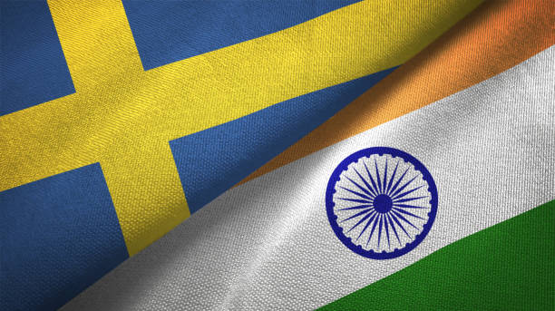 istock India and Sweden two flags together textile cloth fabric texture 1094668386