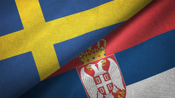 istock Serbia and Sweden two flags together textile cloth fabric texture 1094668776