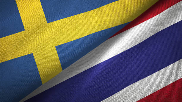 istock Thailand and Sweden two flags together textile cloth fabric texture 1094668940
