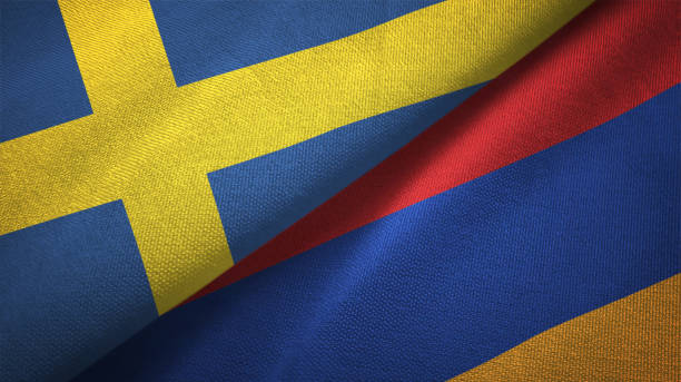 istock Armenia and Sweden two flags together textile cloth fabric texture 1094669008