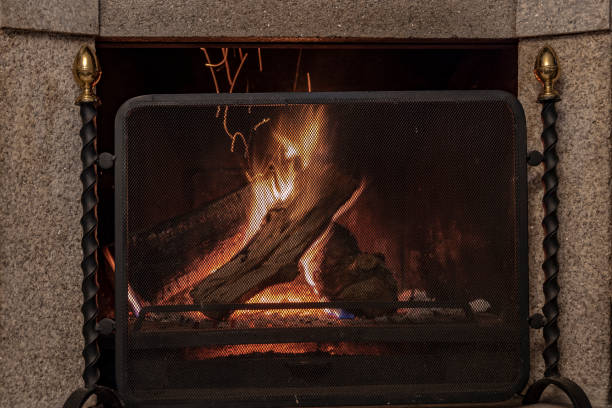 istock A glowing fire in the stone fireplace to warm a chilly night 1094672364