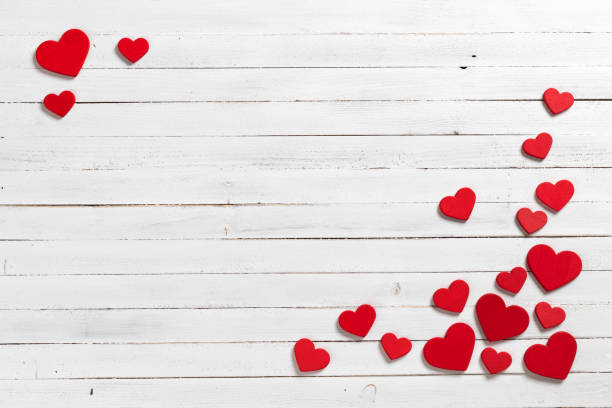 istock Red hearts on wooden white background. 1094679142