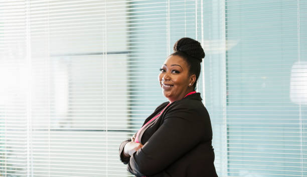 istock African-American woman working in office 1094679292