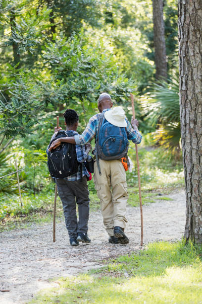 istock Senior African-American couple hiking, exploring 1094682442