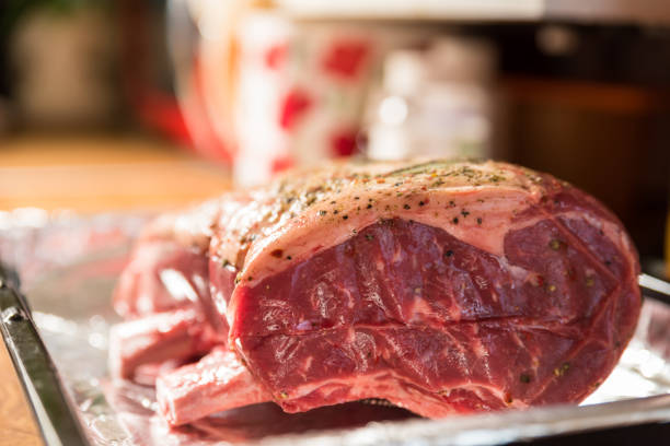 istock closeup view raw beef cross rib chunk on oven tray with foil 1094684298