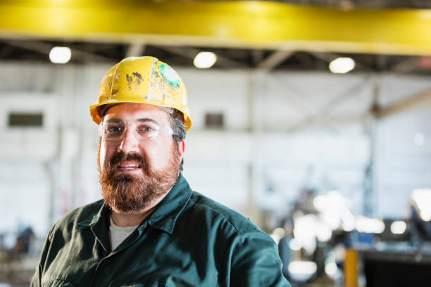 istock Mature man in metal fabrication plant 1094684492