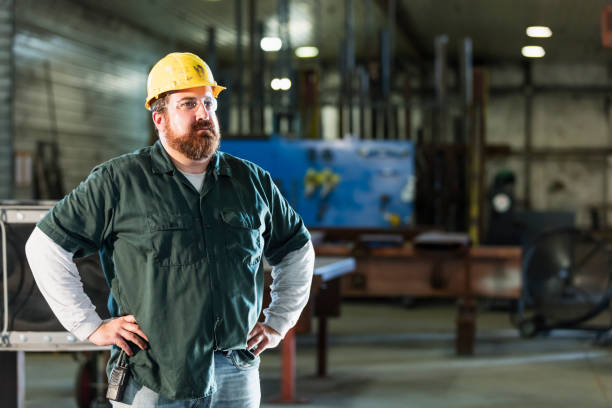 istock Mature man in metal fabrication plant 1094684494