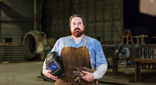 istock Welder in metal fabrication factory 1094687882