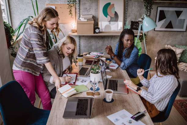 istock Confident Business Woman with Her Team 1094691816
