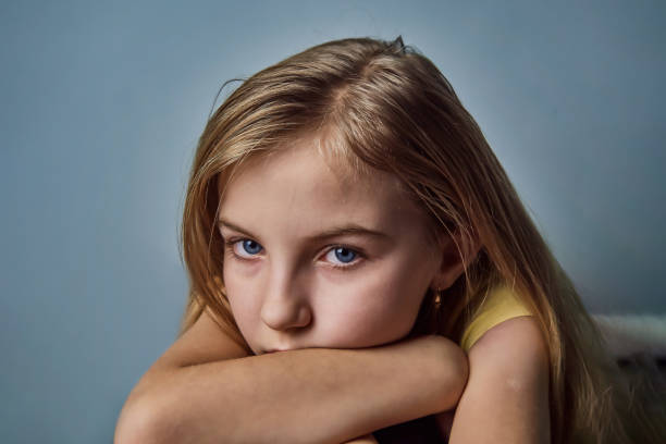 istock girl with emotions on her face 1094694562