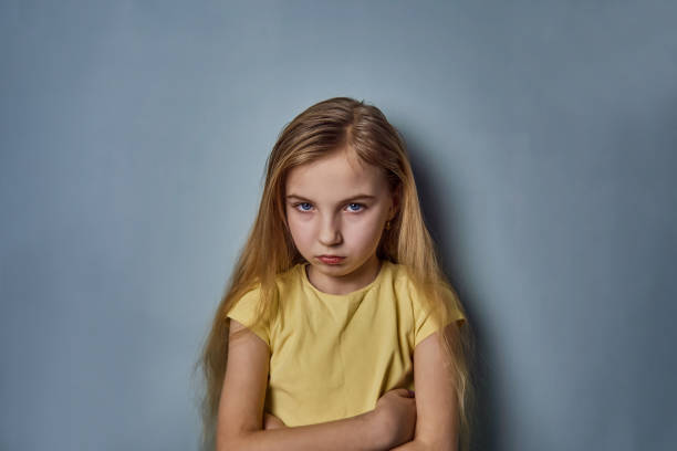 istock girl with emotions on her face 1094694570