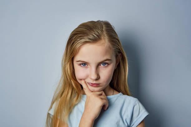 istock girl with emotions on her face 1094694600