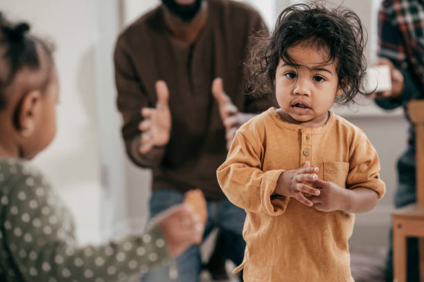 istock Lunch time and two dads with two toddlers 1094695462