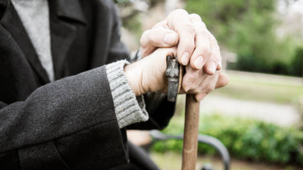 istock Old man sitting in the park 1094695890