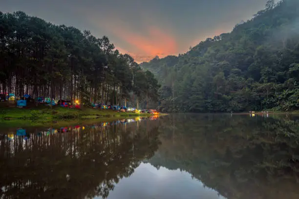 Photo of Beatiful nature lake and forest , Pang oung lake and pine forest in Mae Hong Son , Thailand , nature landscape of Thailand . Pang oung is popular travel destination in Thailand