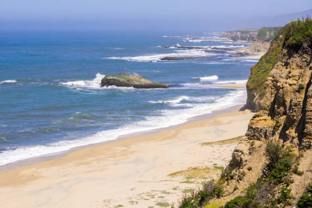 istock Cliffs and sandy beach on the Pacific Ocean coastline near Half Moon Bay, California 1094700716