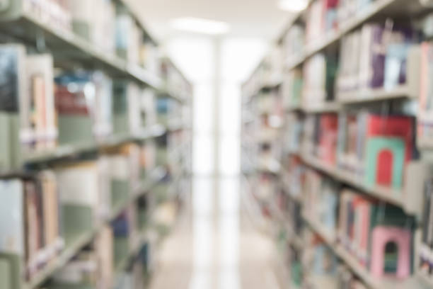 istock Blur school library or study room with book shelves for education background 1094706988