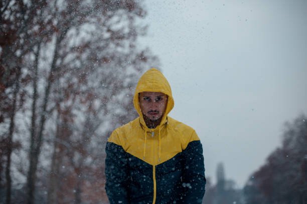 istock Young man exercising on winter day 1094707428