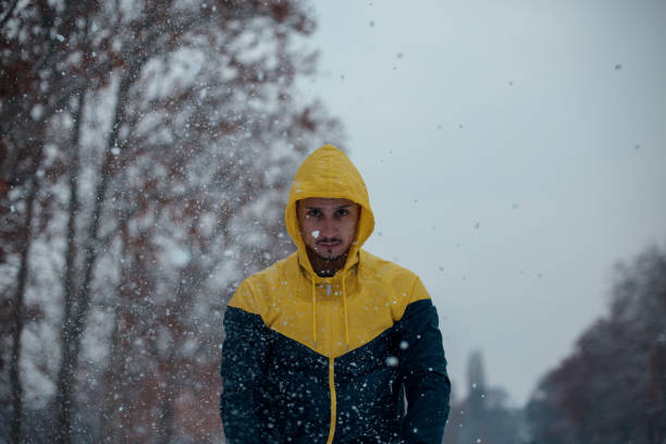 istock Young man exercising on winter day 1094707566