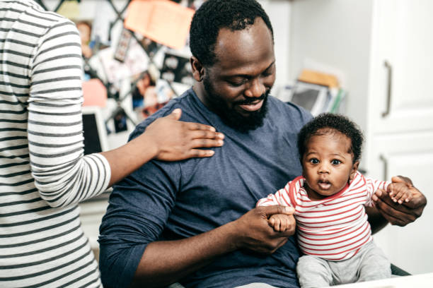 istock Millennial parents and  newborn baby 1094709902