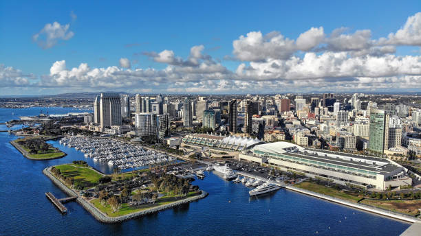 Aerial photo of the San Diego waterfront on an overcast day View of the San Diego skyline from the convention center to Seaport Village. san diego stock pictures, royalty-free photos & images