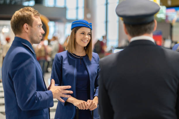 istock Flight attendant talking with the cabin crew at the airport 1094714802