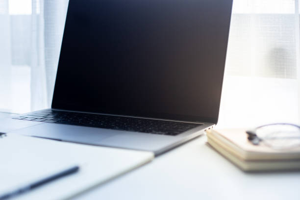 istock Desk Workplace with laptop  on white table ,Tools used for design ,notebook and tablet 1094724636