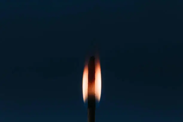 Photo of Small flame of fire on Black Background