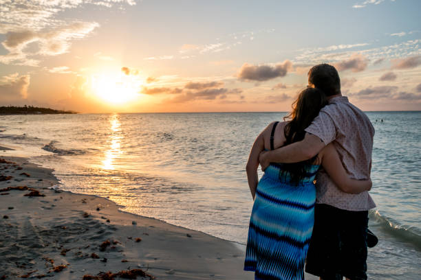 istock Couple relaxing by the beach. 1094730174
