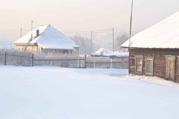 istock Two rural houses. Winter morning. 1094733666