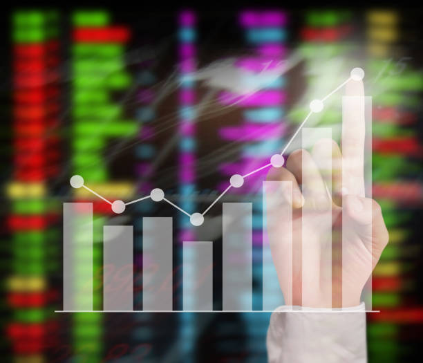 istock financial symbols coming from hand 1094737366