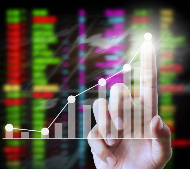 istock financial symbols coming from hand 1094737368