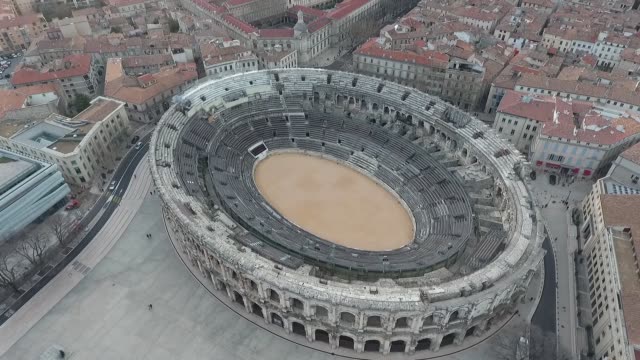 Flying over the old Roman arena in the city of Nimes, France